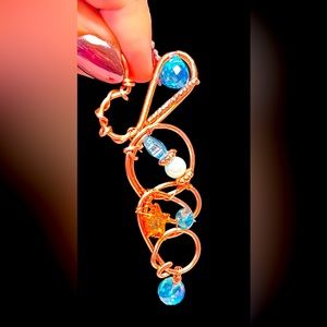 Unique abstract hammered copper pendant